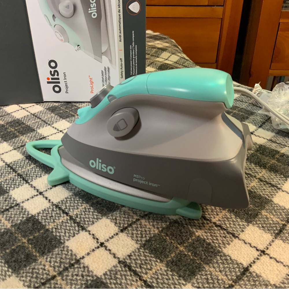 Oliso M3 Pro Project Iron in Gray and Aqua with Trivet